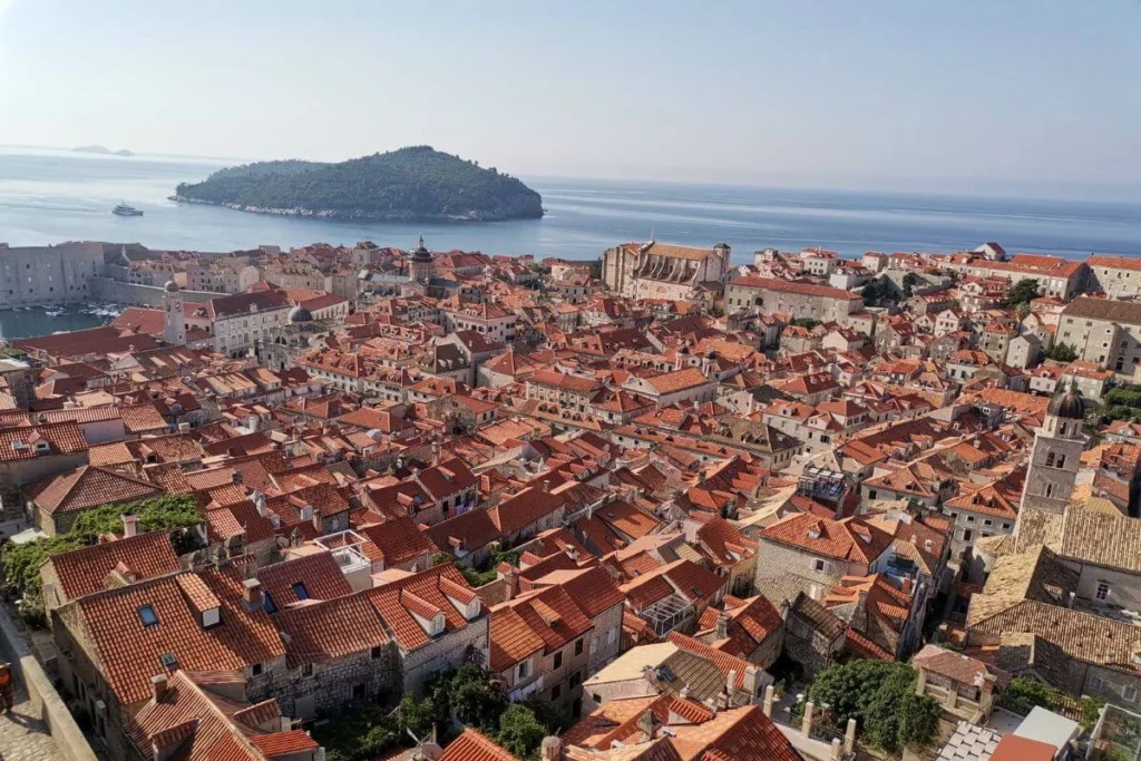 Panoramic view from the Dubrovnik city walls overlooking the stone streets and steep stairs of the Old Town, illustrating the need for a baby carrier.