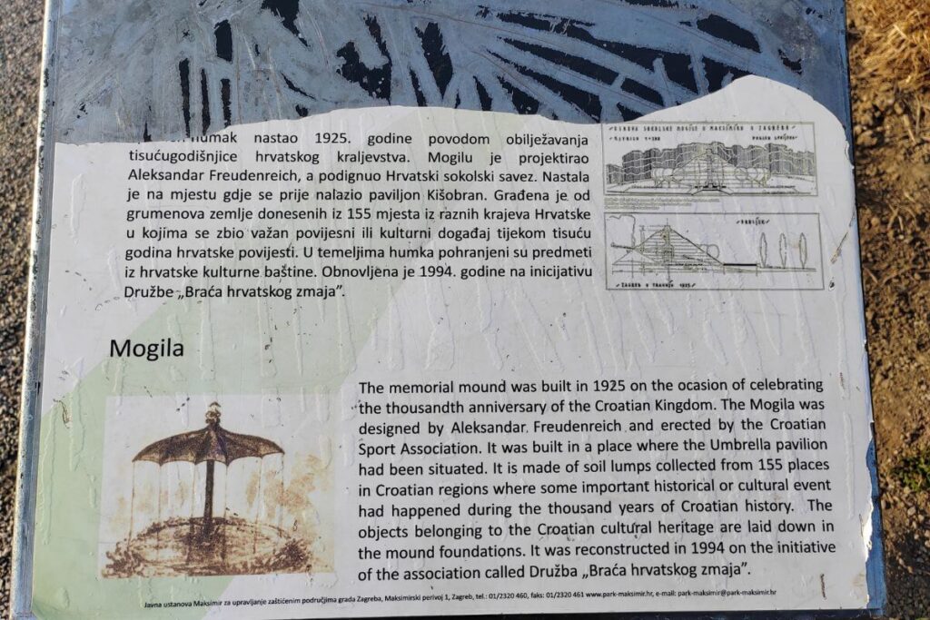 An informational sign explaining that Mogila was built in 1925 to celebrate the thousandth anniversary of the Croatian Kingdom.